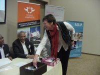 Ms Rose Luke (UJ) doing the lucky draw on behalf of T-Systems SA (Pty)Ltd
