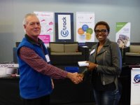 Mr Basil Jonsson (SARF) handing over the prize to the lucky draw winner on behalf of SARF